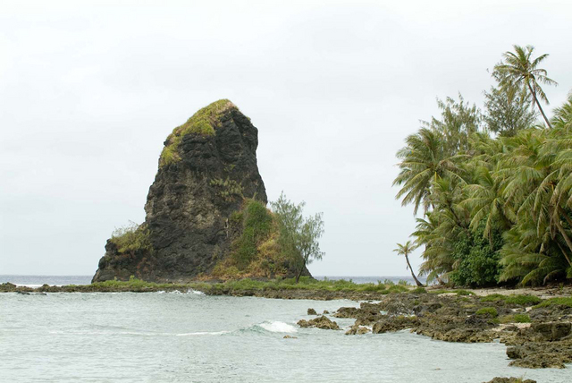 0030-vc-031-fouha-rock_normal Fouha Rock Creation god Fu'una used her supernatural power to create part of the world by throwing her body into the earth and creating Fouha Rock, were the first human beings emerged. Victor Consaga/Guam Humanities Council