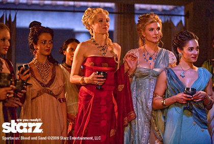 Lucy Lawless (center) as Lucretia