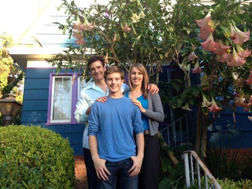 Julian Larach (center) with cast members from the House of Temptation